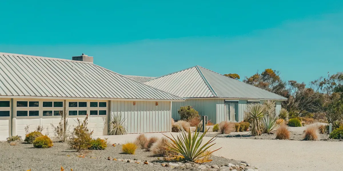 Wildfire-resistant home with metal roof and defensible space.