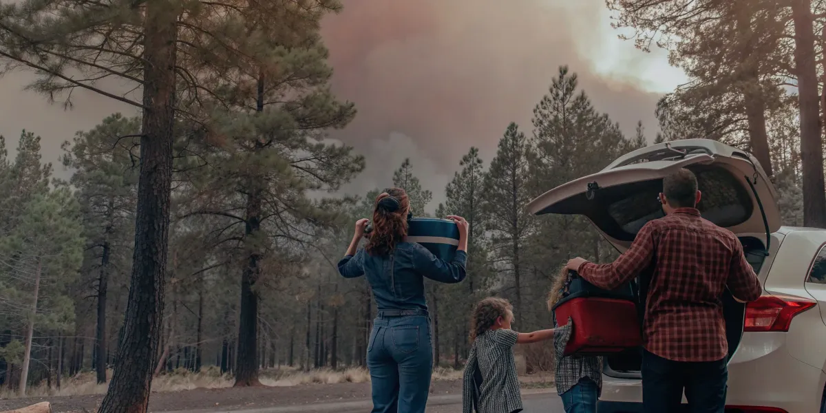 Northern California family putting their fire evacuation plan into action by packing their car.