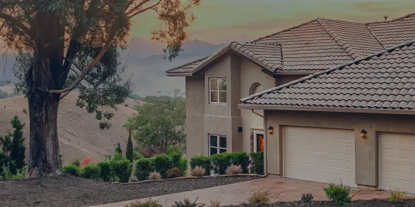 California home with fire-resistant landscaping in high-risk area.