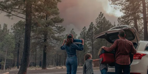 Northern California family putting their fire evacuation plan into action by packing their car.
